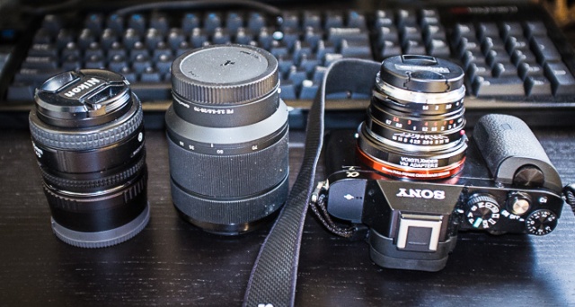 Kit zoom and tiny Nikkor 50mm 1.4D with adapter are too big... M-mount adapter and Voigtlander lens are much smaller and more useful.